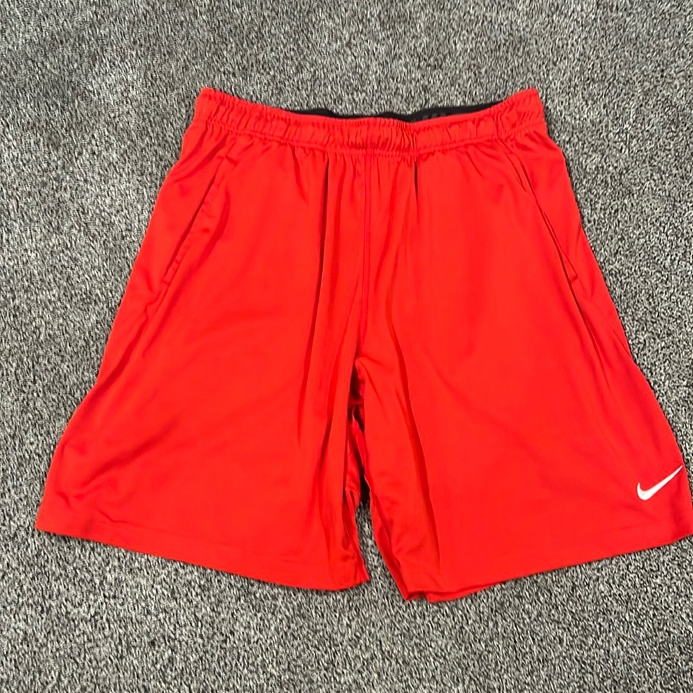 Bright red Nike shorts